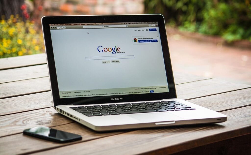 google-open-mac-book (1) Google homepage opened on a MacBook screen, reflecting everyday digital life.