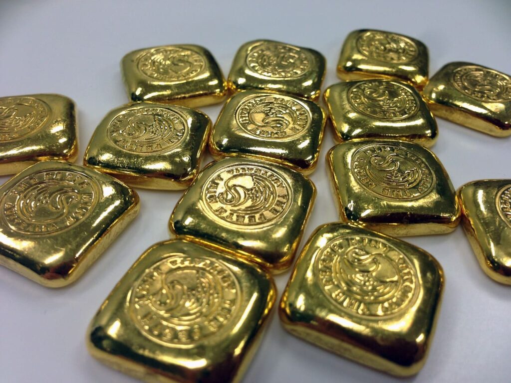 gold-bar (1) Close-up image of gold bars illustrating the bullion market impacted by U.S. tariff announcements.