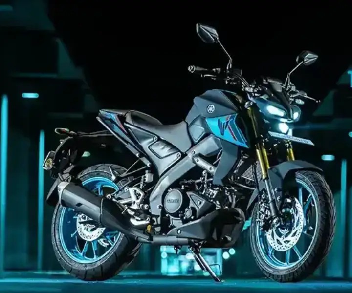 mt-15-bike-in-dark-glowing-background Yamaha MT-15 bike showcased against a dark background with glowing highlights, emphasizing its sporty design.