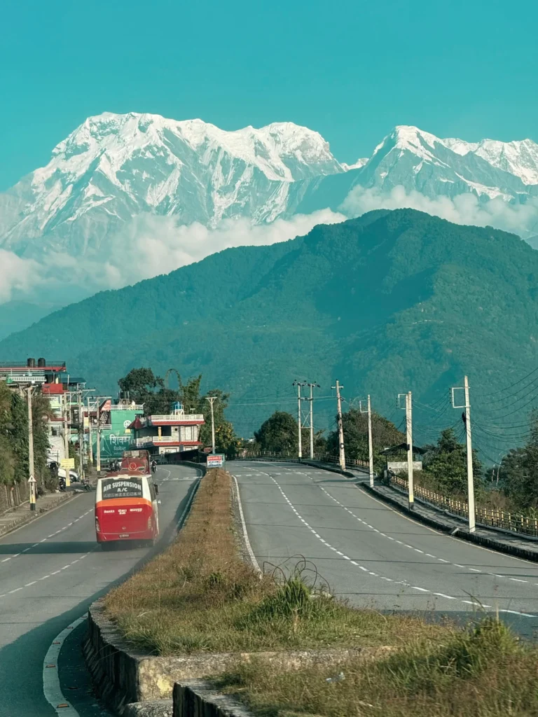 Winding roads to Pokhara Valley – every turn unfolds breathtaking views of rivers, hills, and rural life.