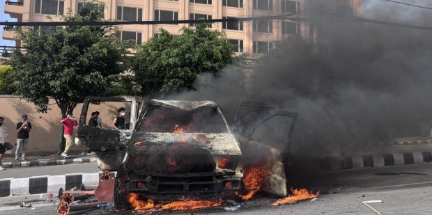 Gen Z protest in Nepal with vehicles set on fire during clashes in New Baneshwar.