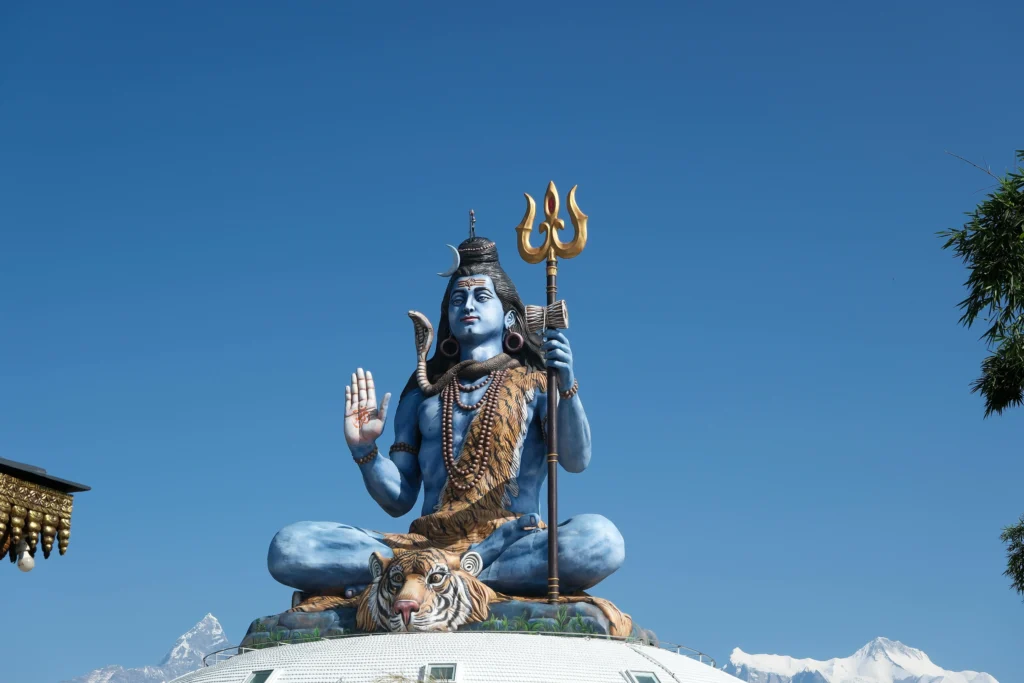 Massive Lord Shiva statue at Pumdikot, Pokhara, overlooking the valley with the Annapurna mountains in the backdrop