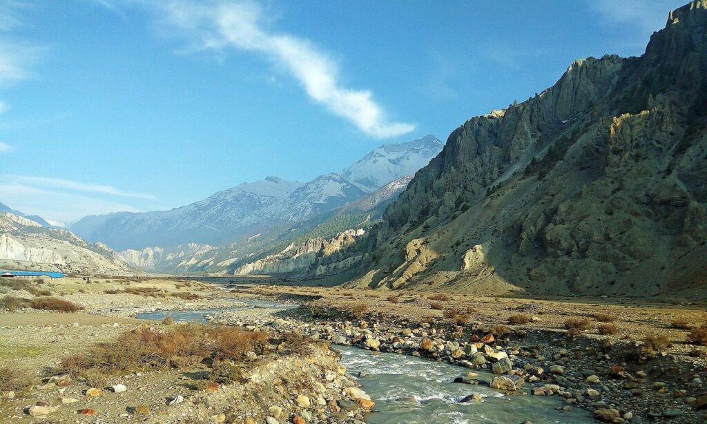 Scenic view of the Kali Gandaki valley in Upper Mustang with rugged cliffs and desert-like mountains, used as the featured image for news about the new $50-per-day permit rule.