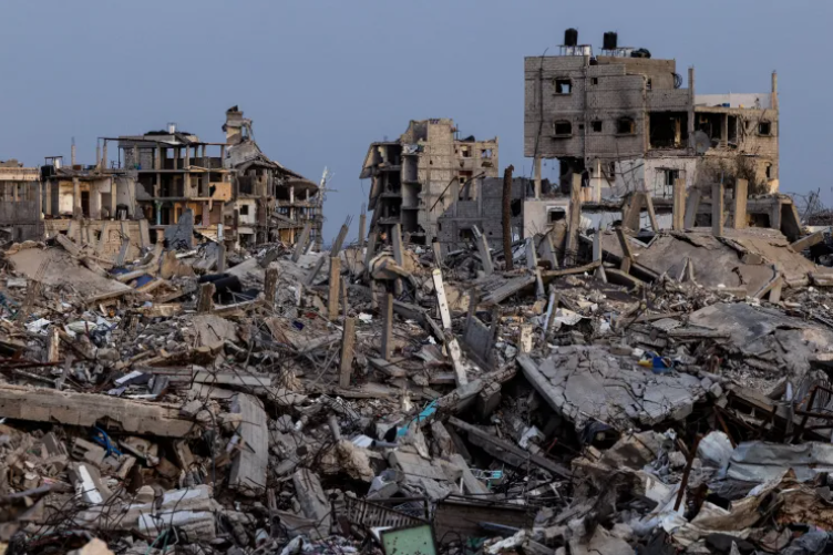Destroyed residential buildings and widespread rubble in Gaza following weeks of heavy bombardment.