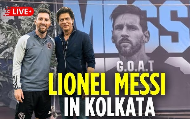 Lionel Messi in India during the GOAT India 2025 event, posing as fans gather to see the football icon.