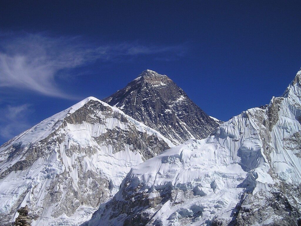 Mount Everest peak rising above the Himalayas in Nepal, the highest mountain in the world.