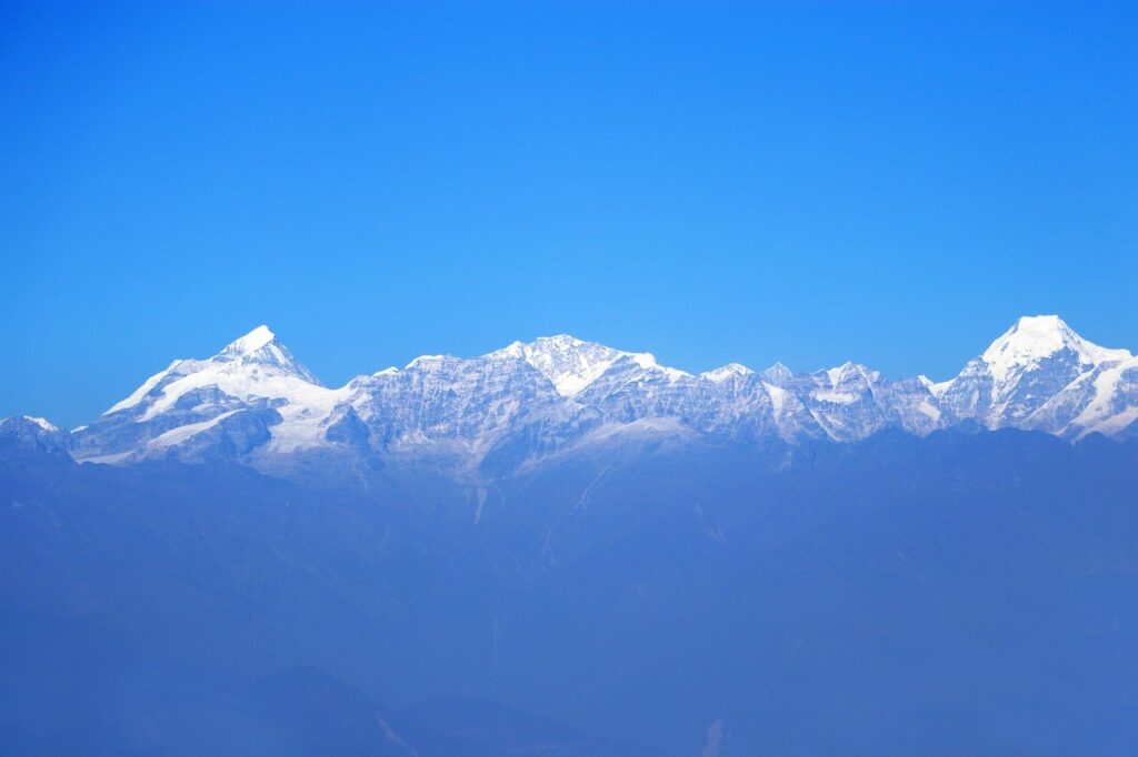 Golden sunrise and misty hills during a peaceful morning in Nagarkot